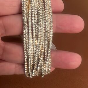 Beautiful crystal multi strand, gold stretch bracelet